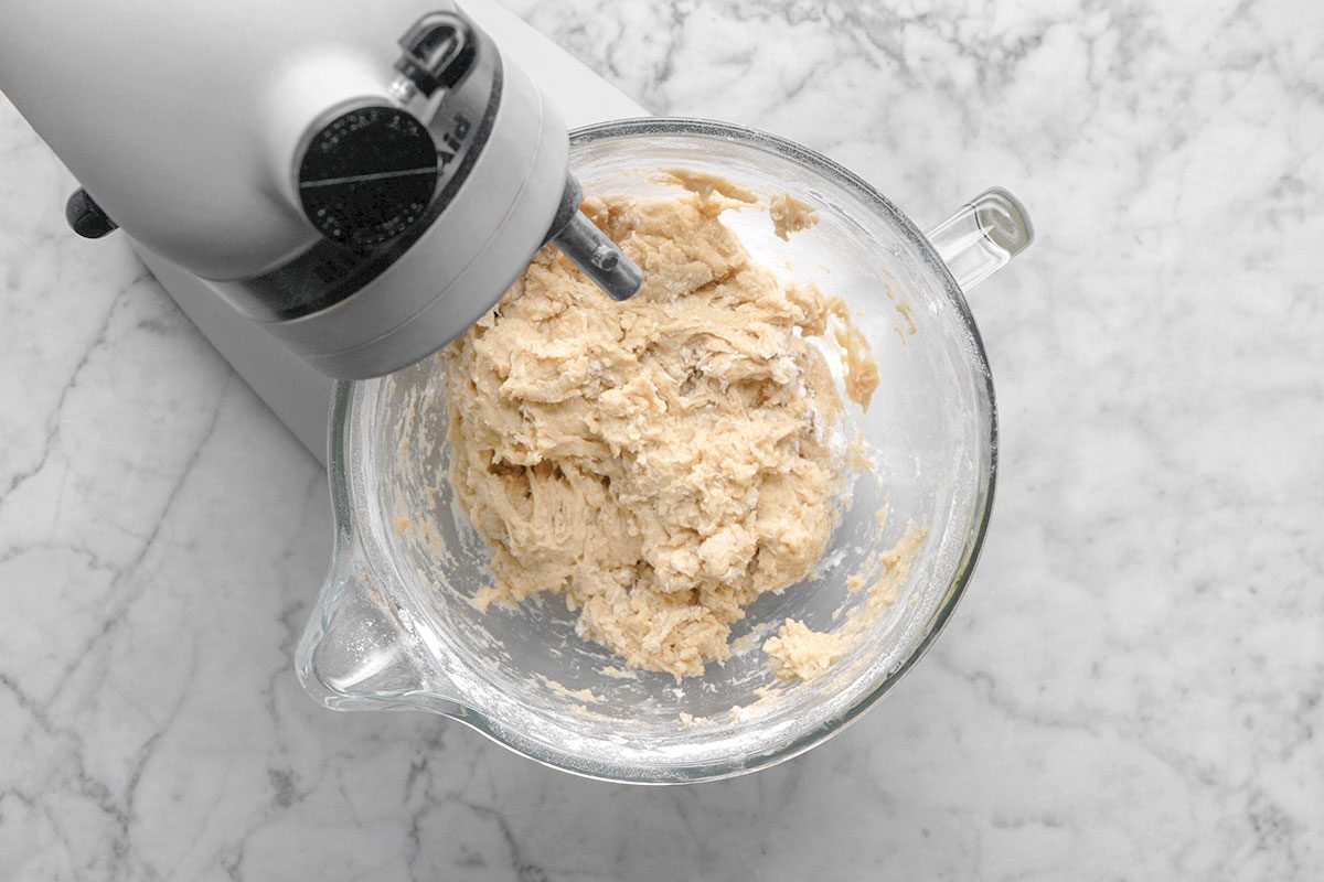 Mixture being mixed to make a dough