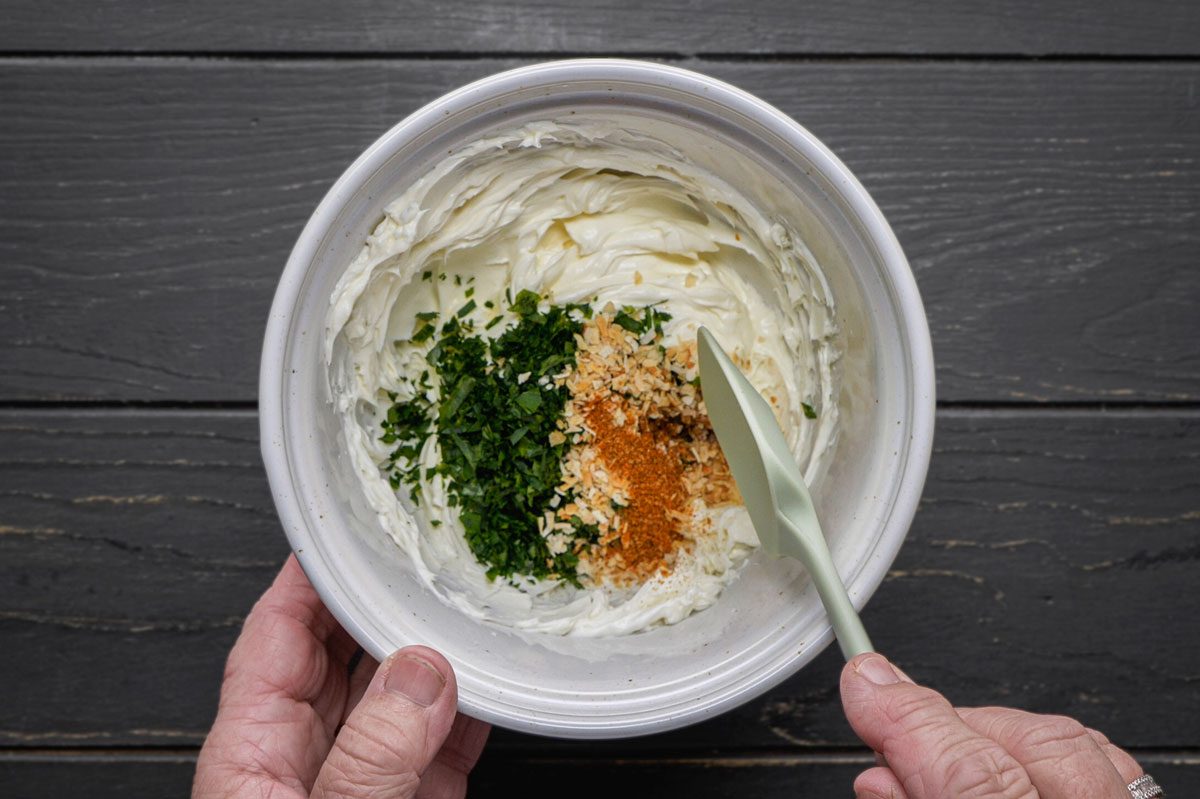 Add the parsley, onion, Worcestershire sauce and seafood seasoning; mix well.