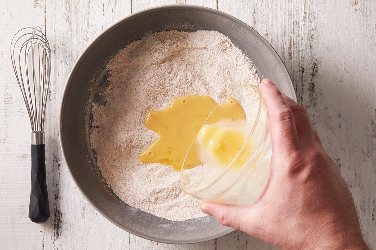 In a small bowl, whisk egg and vanilla.