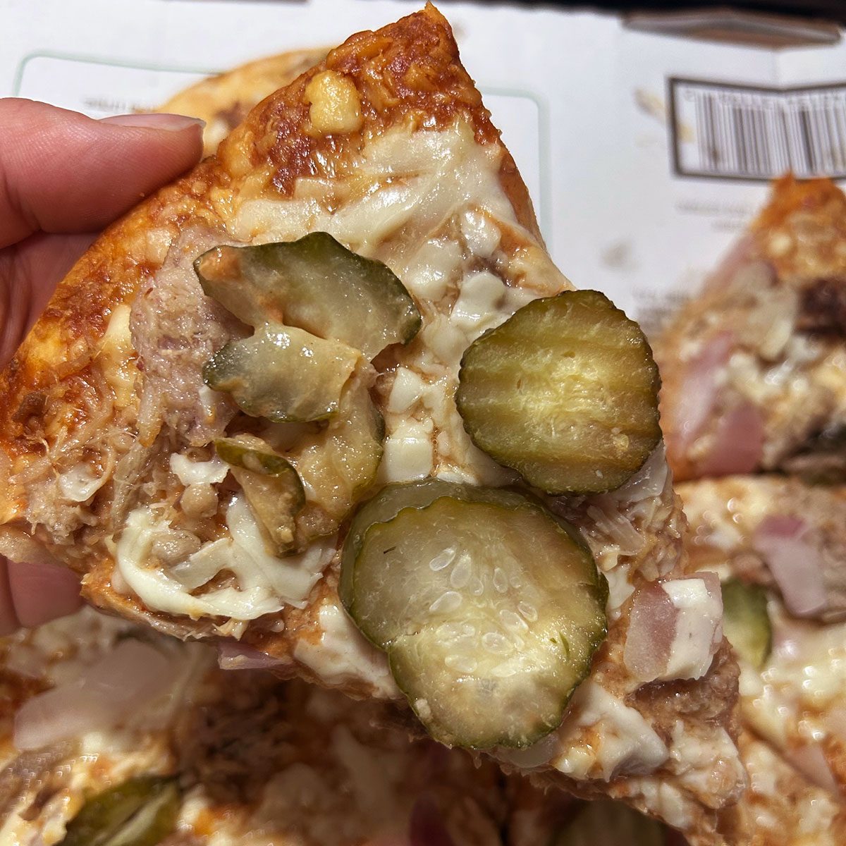 close-up of slice of Grillo's Pickle Pizza