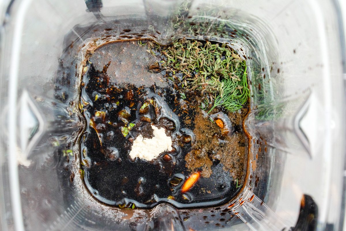 balsamic vinegar, honey, basil, onion powder, dill, oregano, thyme, garlic, white pepper and mustard mixed in a blender