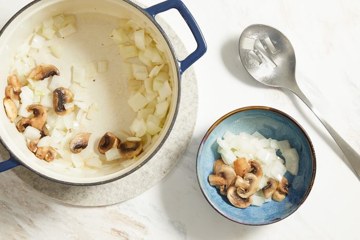 sautéed onions and mushrooms set aside in a small bowl