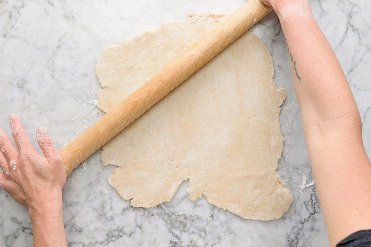 rolling out portion of pastry