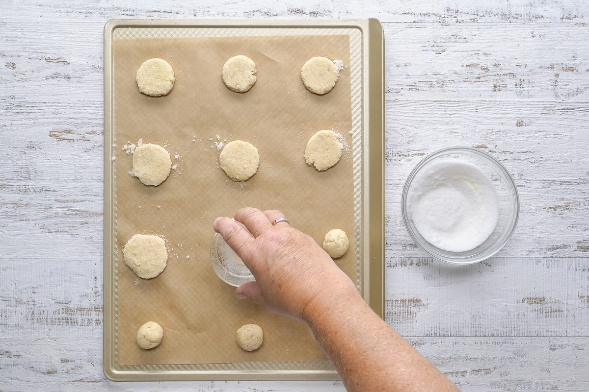 shaping dough into cookies
