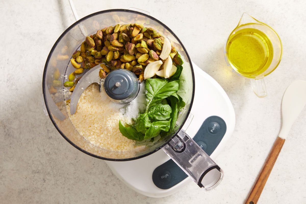 Place the pistachios, parmesan, basil, garlic and salt in a food processor;
