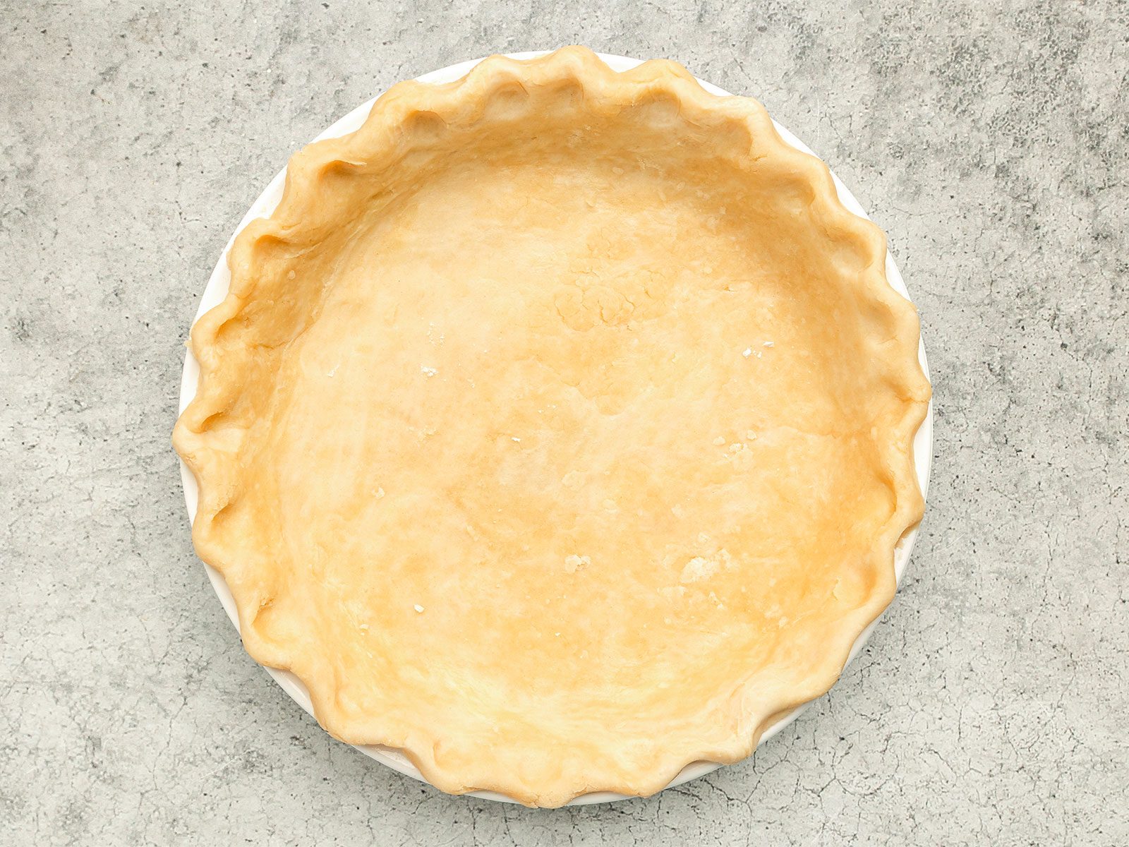 Dough in pan grey background