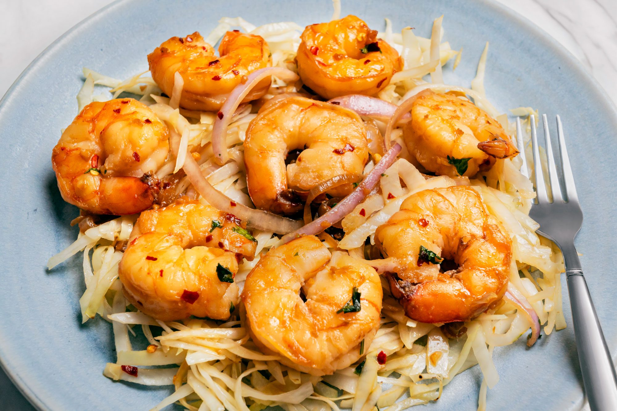 Close up shot of Thai Shrimp served with cabbage