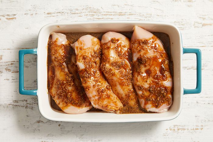 add chicken and marinate with fajita mix