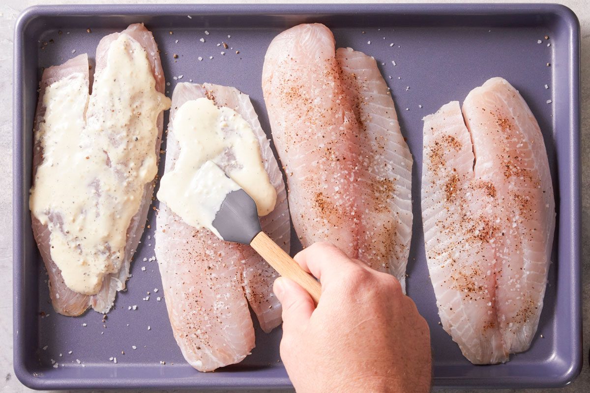 Spread fish evenly with mayonnaise mixture.