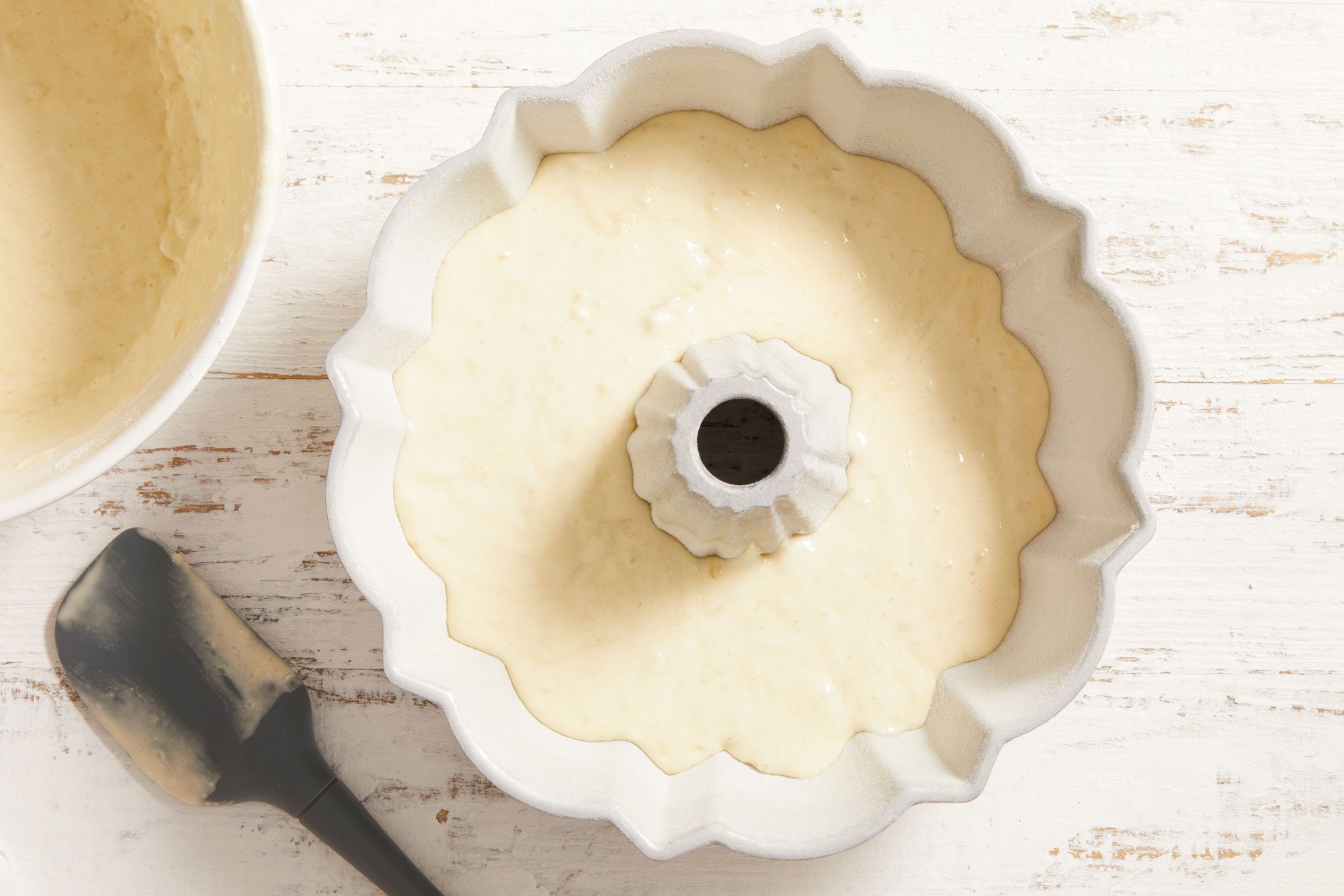 Add batter in the fluted tube pan