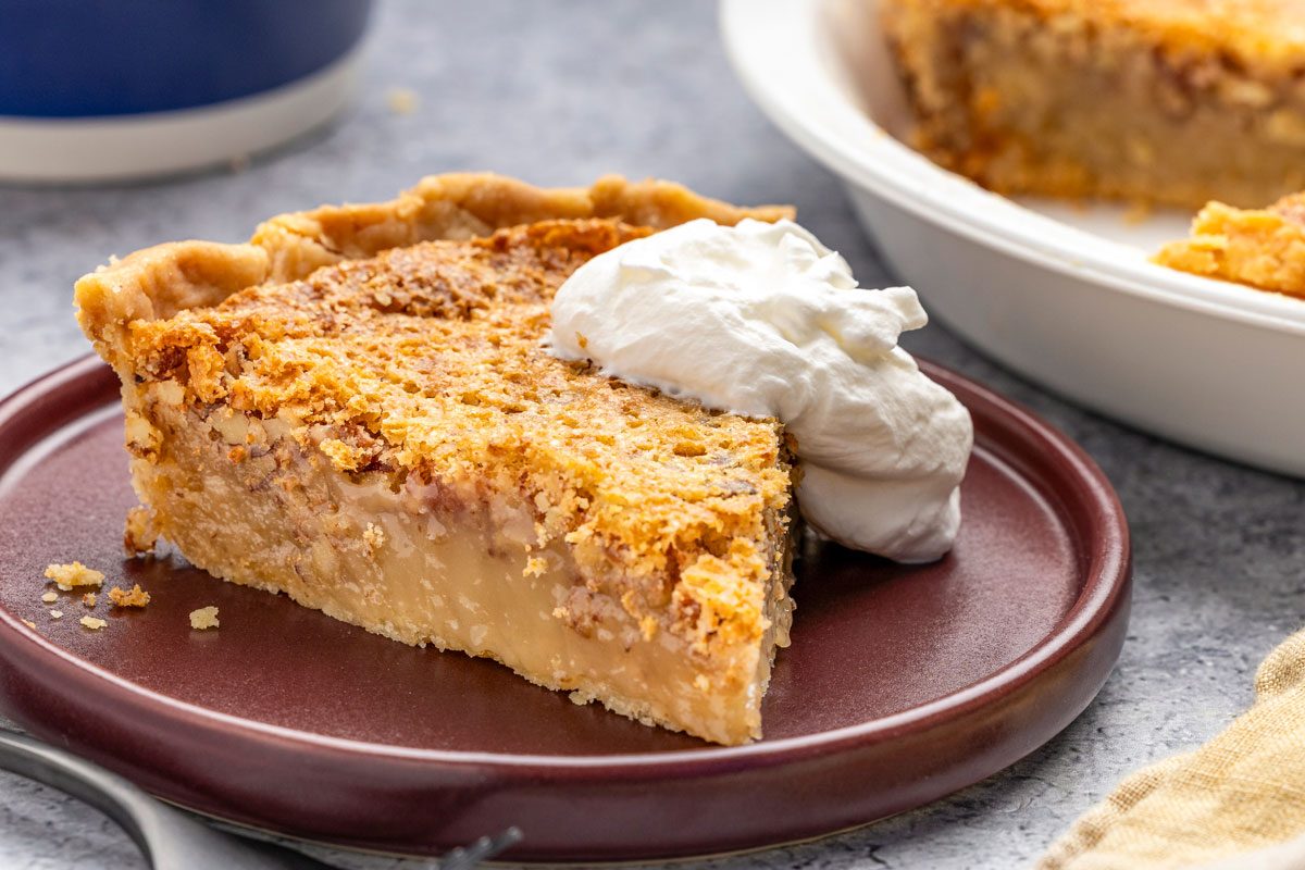 Pecan Chess Pie is ready and serve it with whipped cream