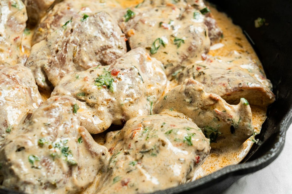 Close up shot of Tenderloin with Herb Sauce;