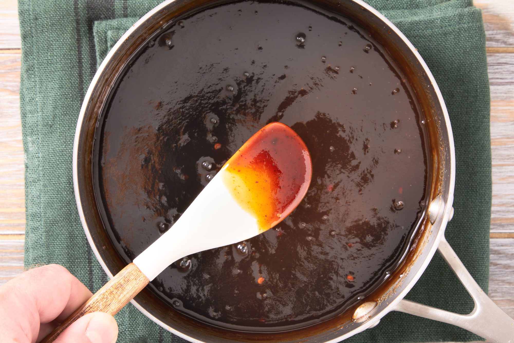 cook until liquid is reduced by half