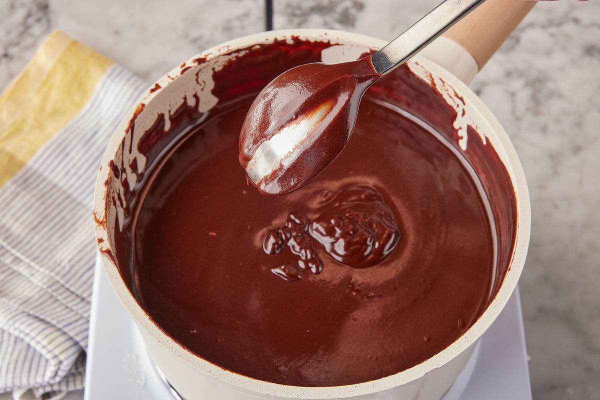 A thick chocolate mixture in the saucepan