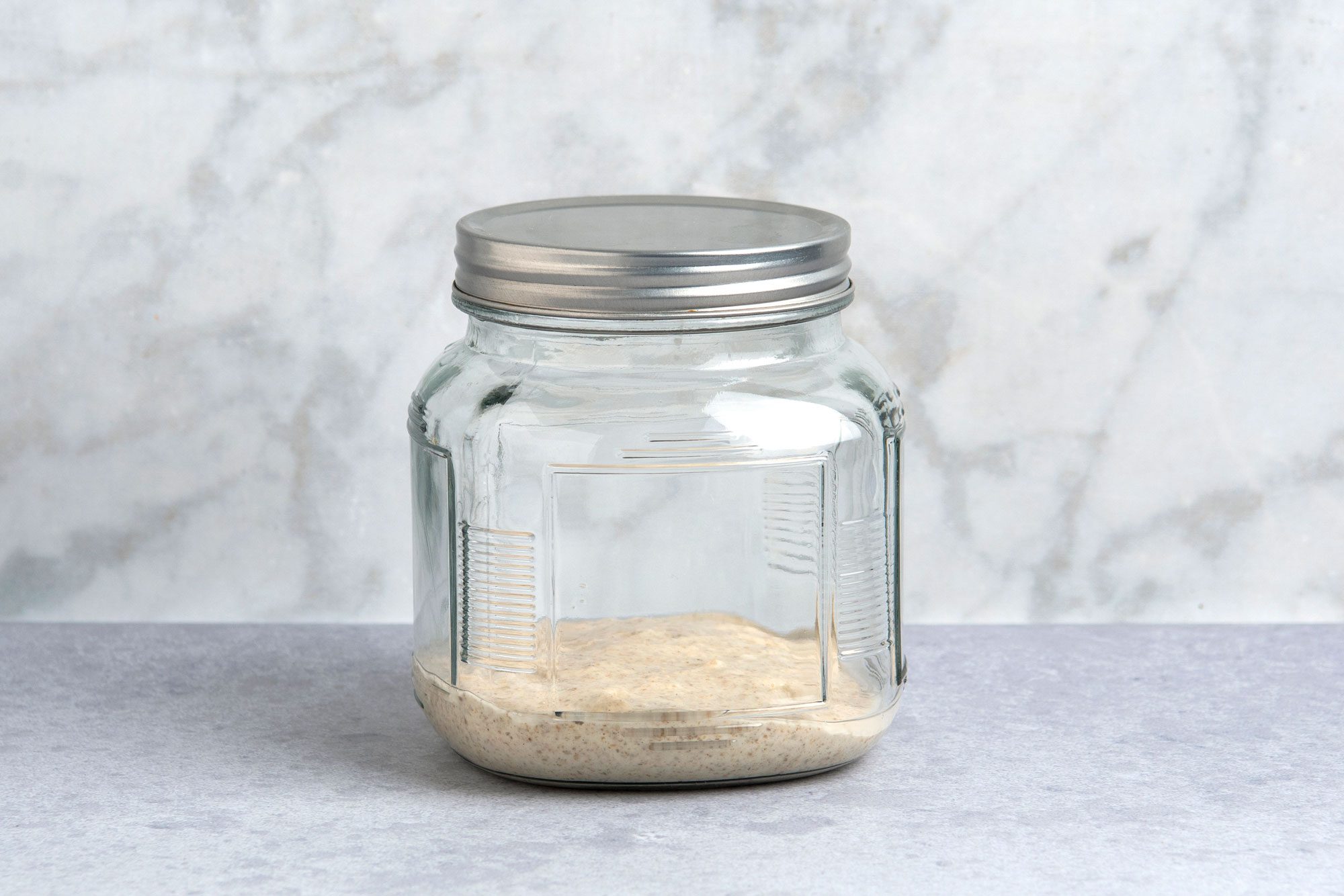 Add another 115 grams bread or whole wheat flour and 115 grams room temperature water to the starter