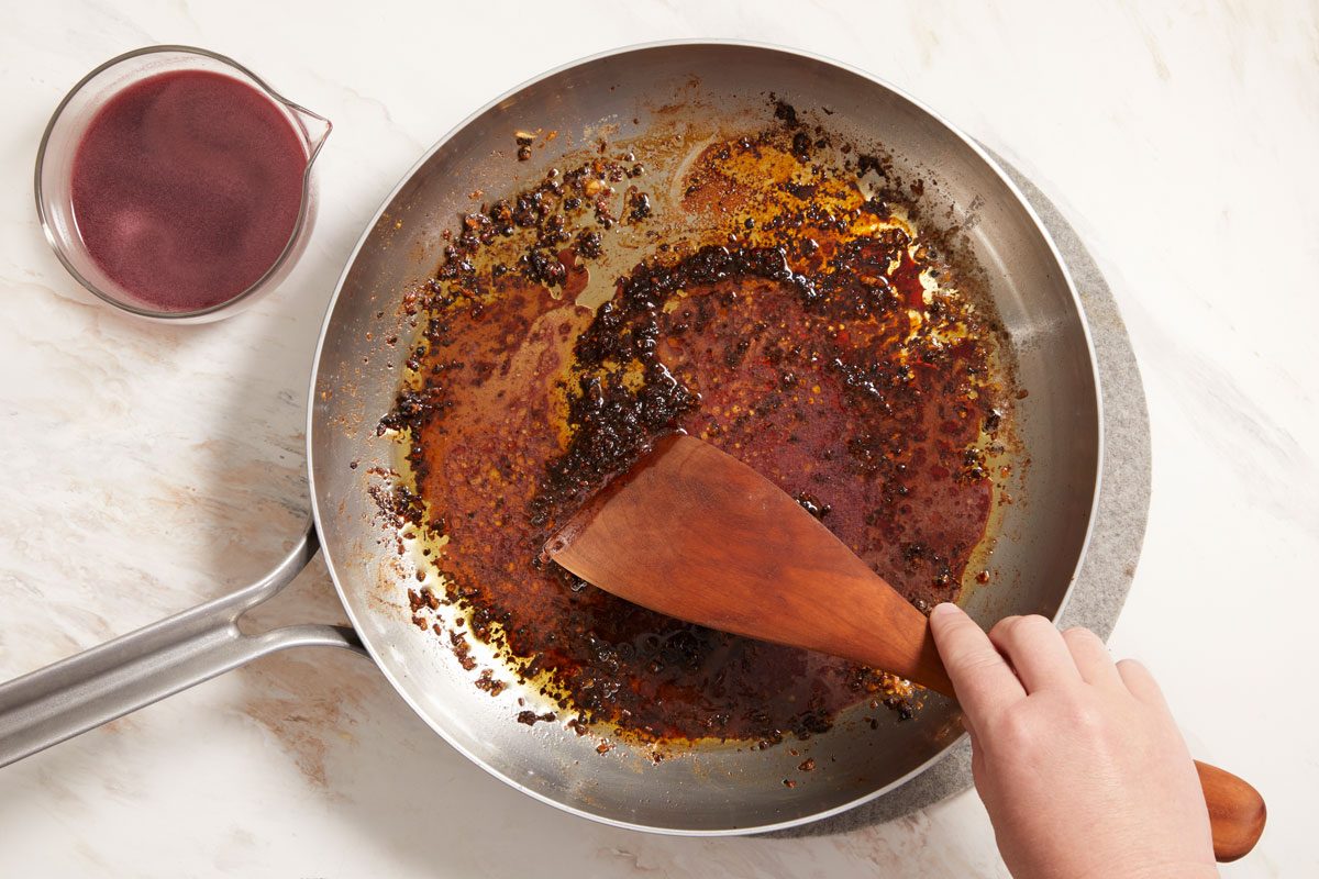 Combine wine, mustard and sugar;