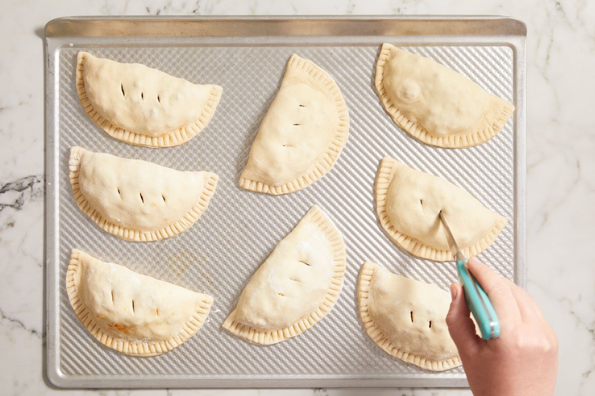 Fold dough over filling; press edge with a fork to seal.