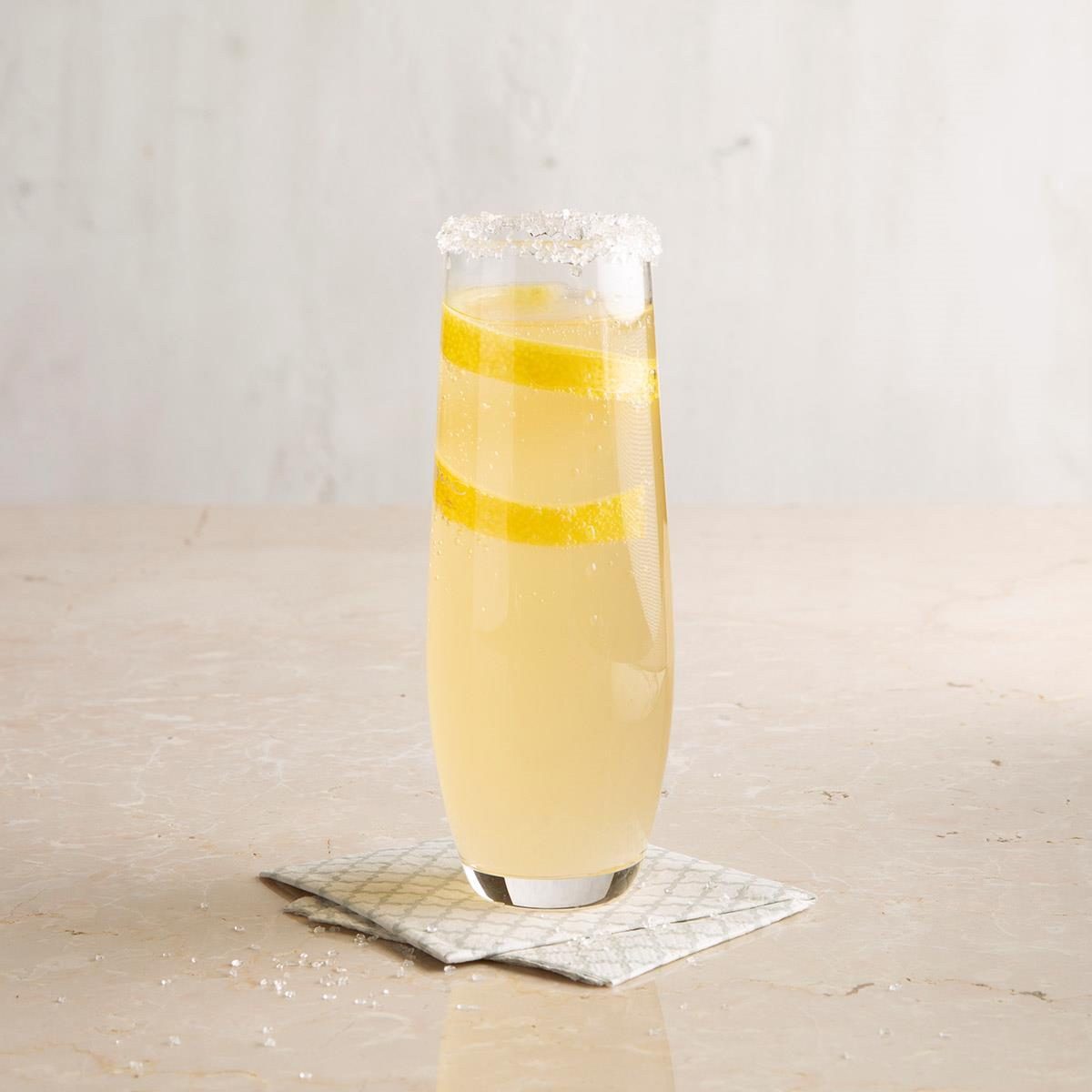 Glamorous Cocktails To Celebrate Your Showgirl Era Opalite French 75