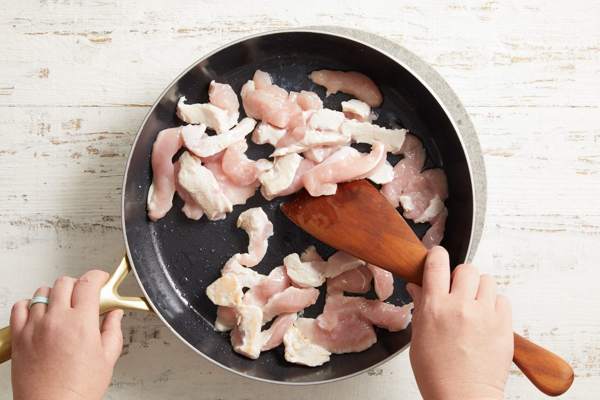 turkey being cooked in a skillet
