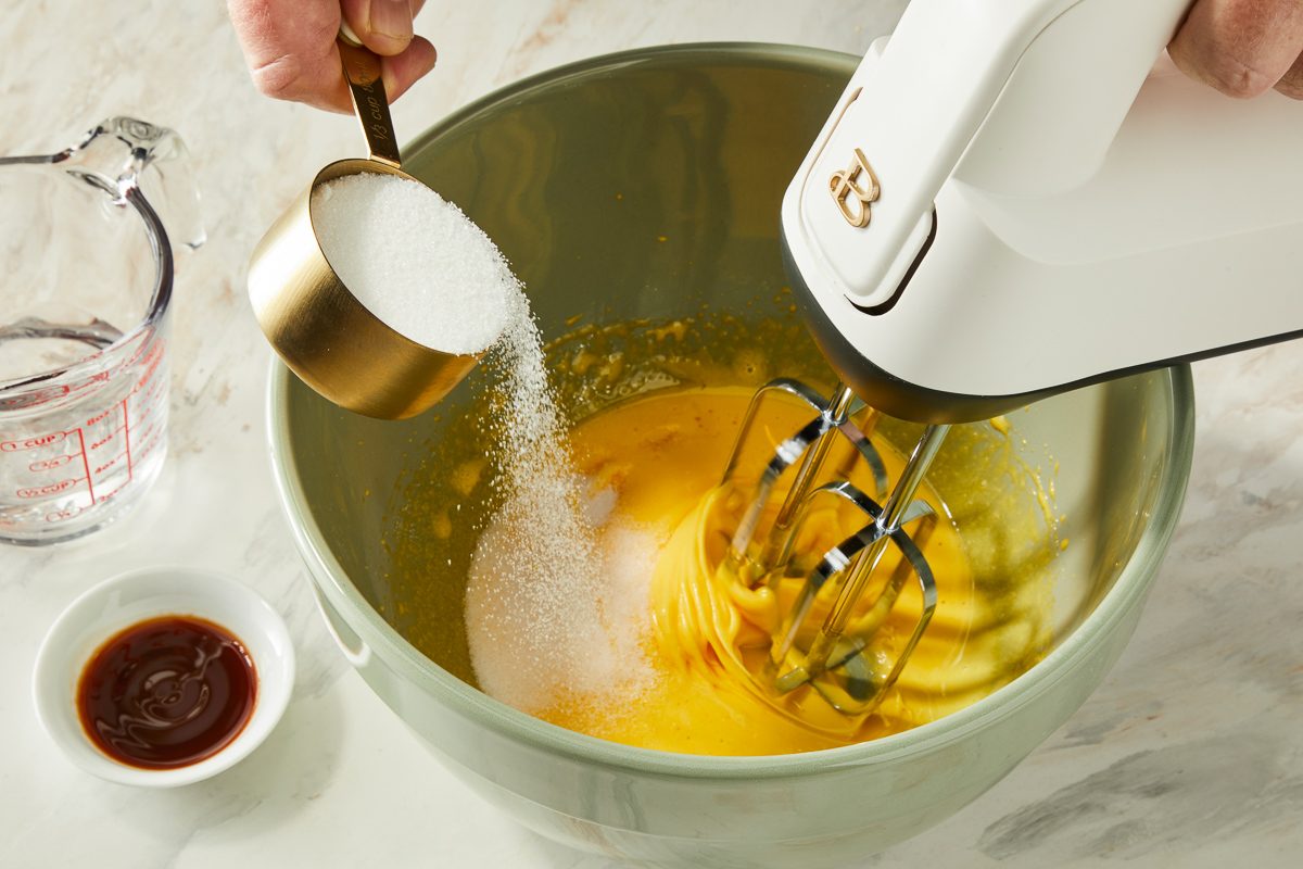 beating egg yolks while adding sugar