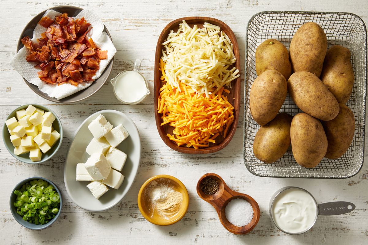 potatoes, sour cream, cream cheese, butter, milk, bacon, cheese, green onions and spices