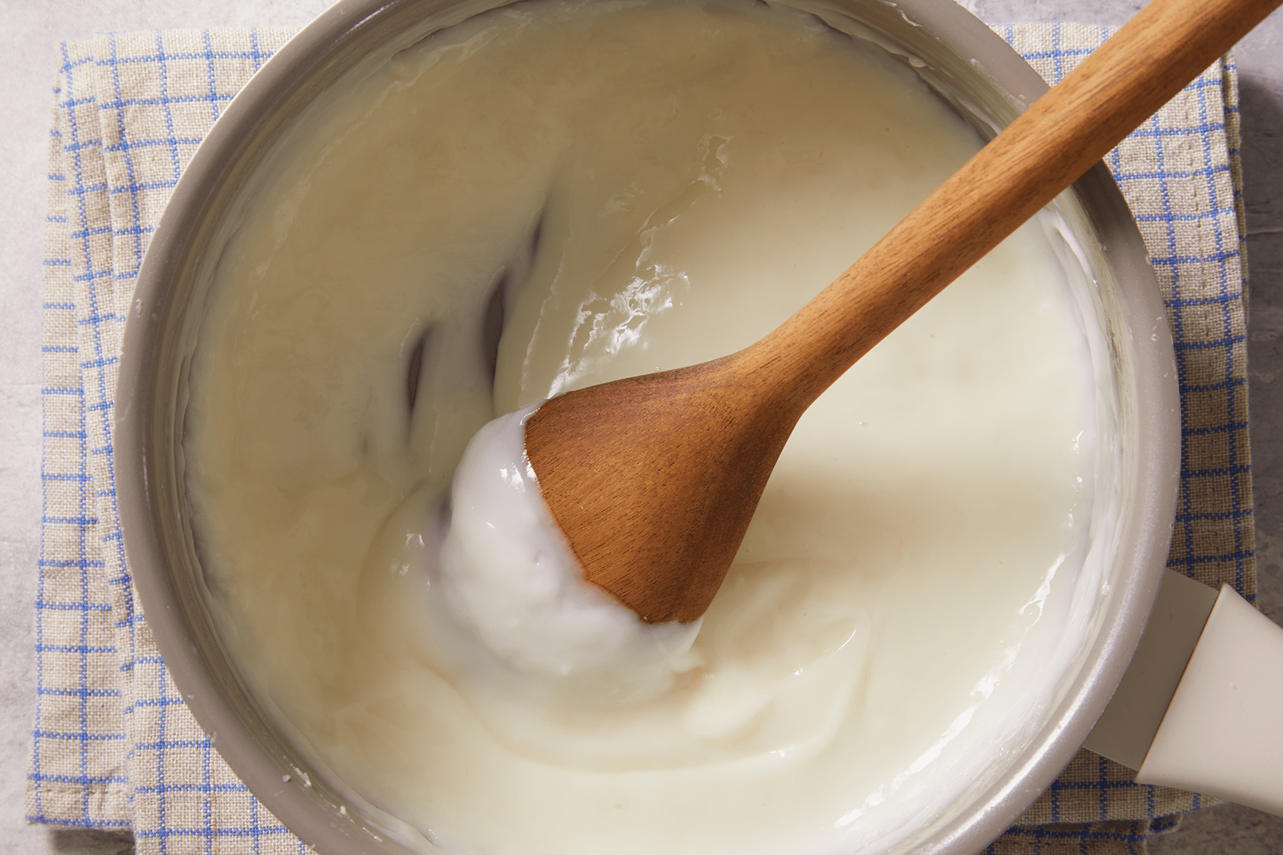 Thickened mixture of salt, milk, starch and sugar