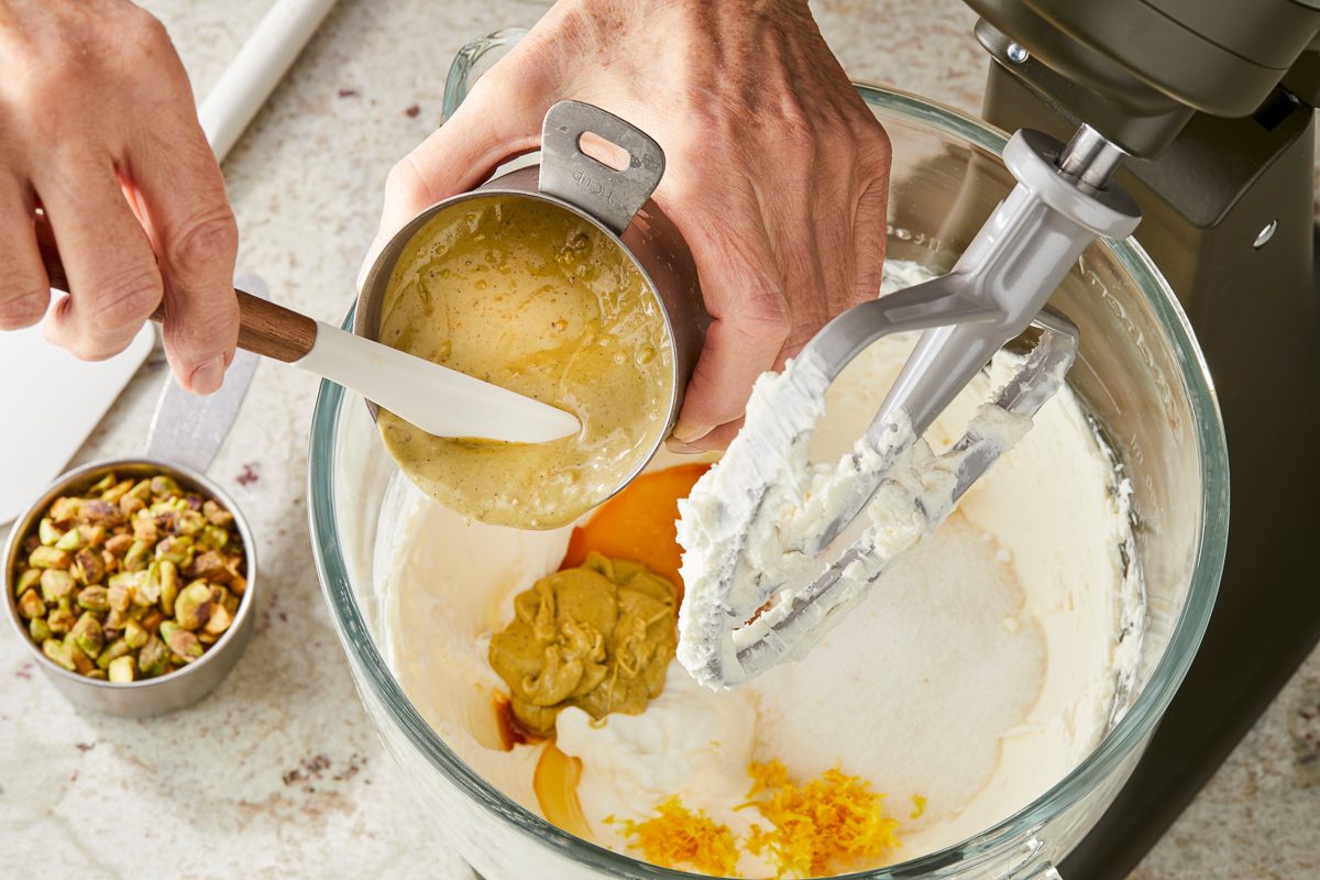 pistachio butter being added to mixer
